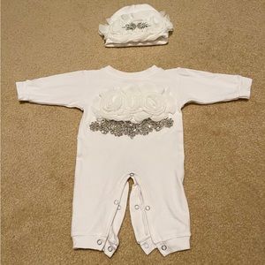 Beautiful white one piece with rose and crystal detail and matching hat